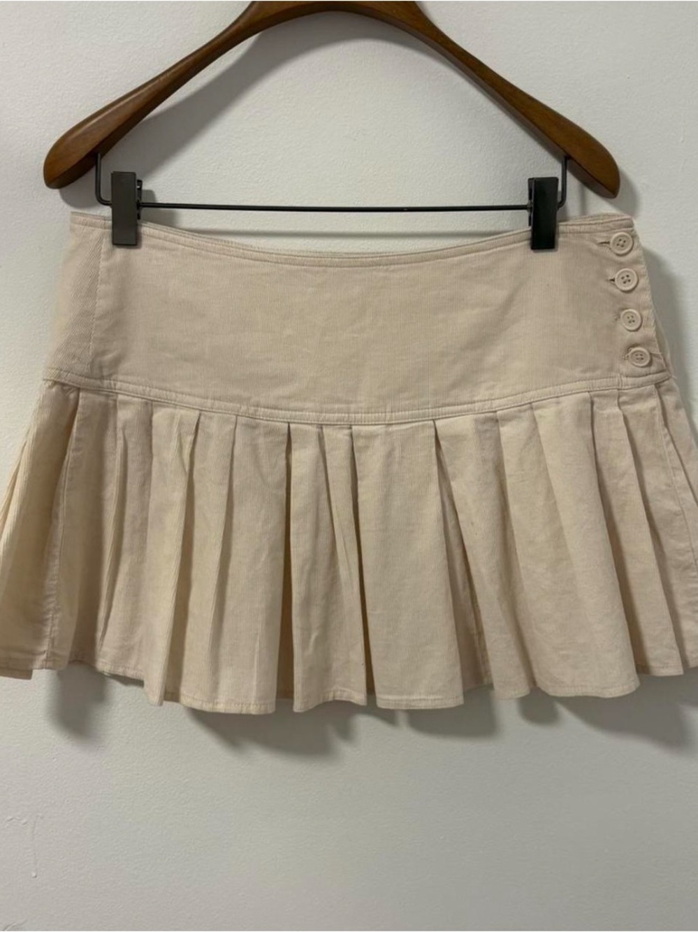 Brandy Melville cream mini skirt with button closure